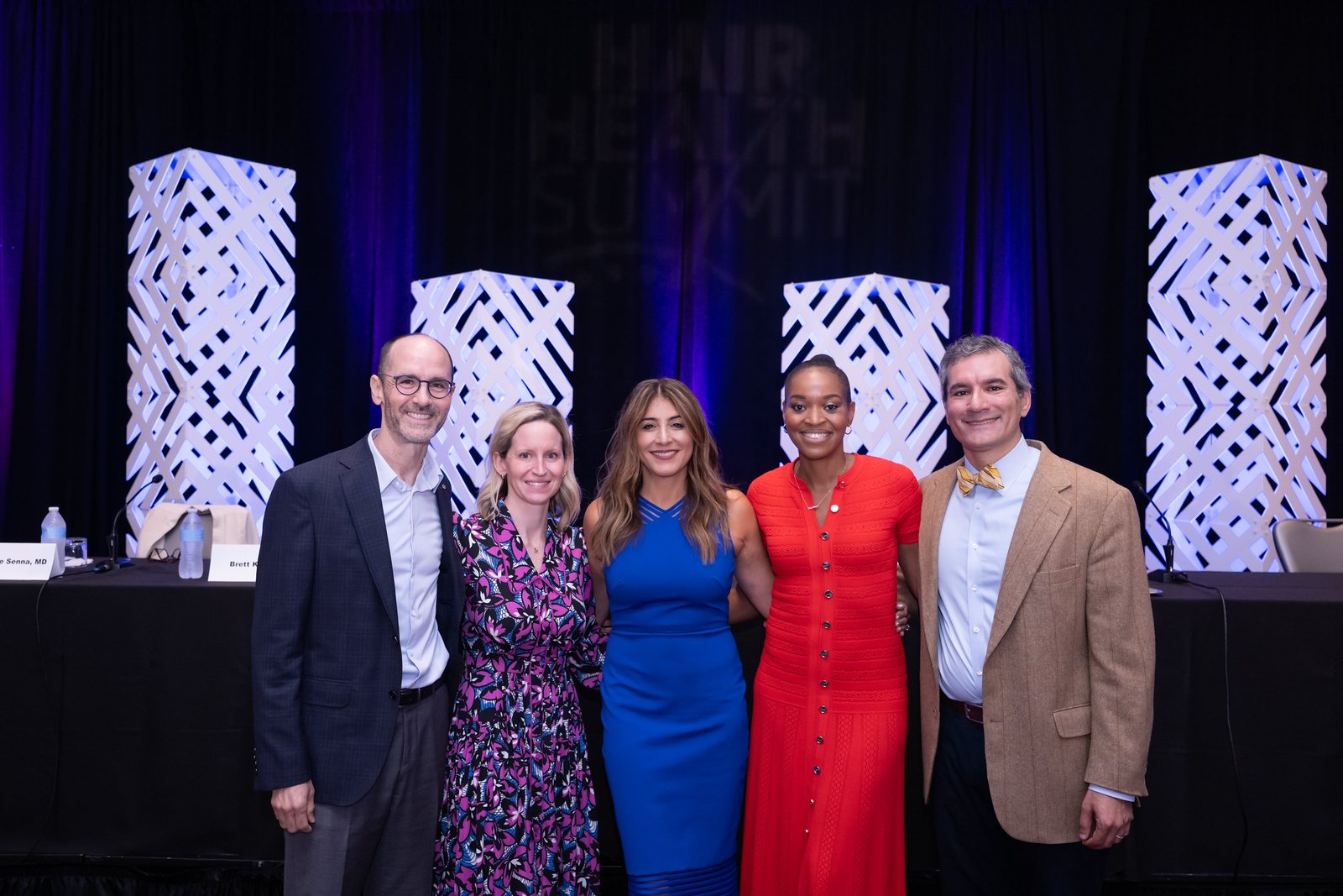 Dr. Senna with fellow speakers on stage at the 2026 Hair Health Summit